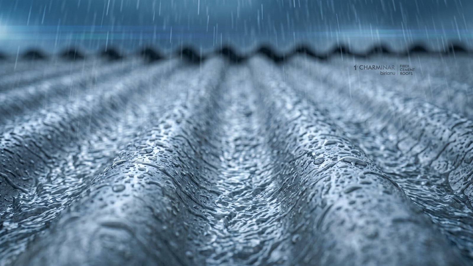 Rain falls on corrugated fibre-cement roof sheets with a small CHARMINAR mark