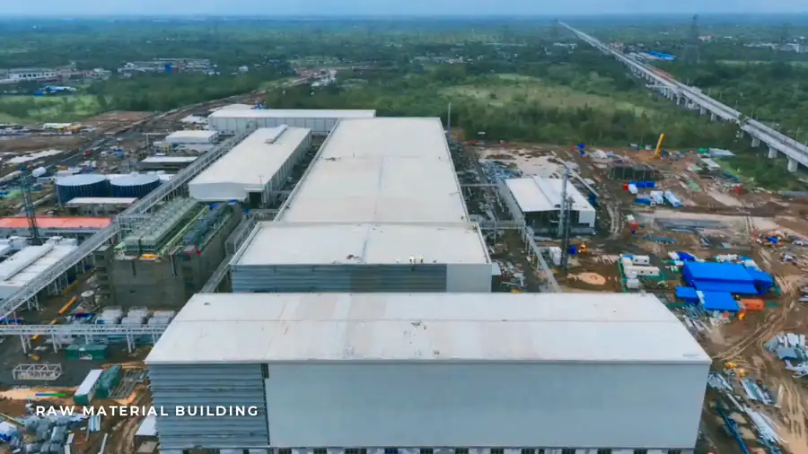 GPS-locked drone vantage point over the Waaree Rola plant during construction